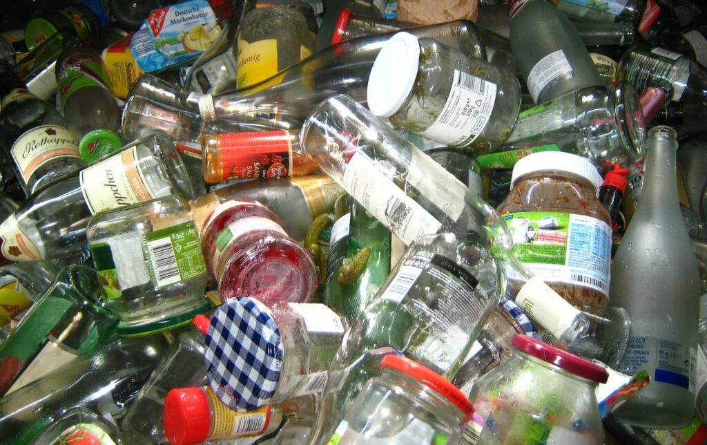 glass bottles in bin